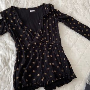 gold and black romper